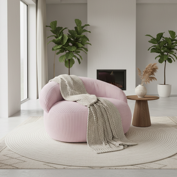 Pouf XXL déhoussable en velours côtelé, forme arrondie, dans un salon