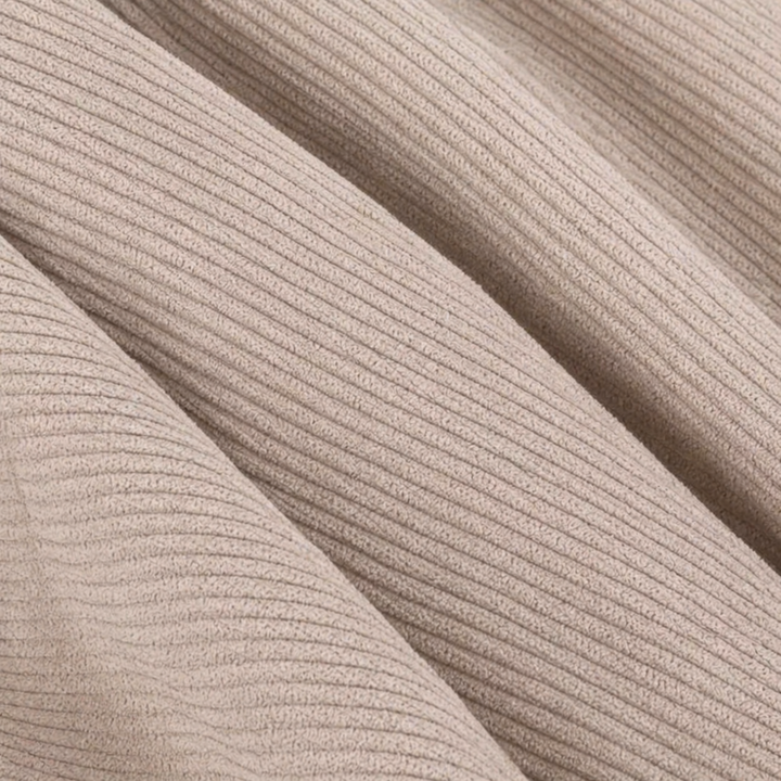 Détail du tissu : velours côtelé beige, reliefs en fines nervures.