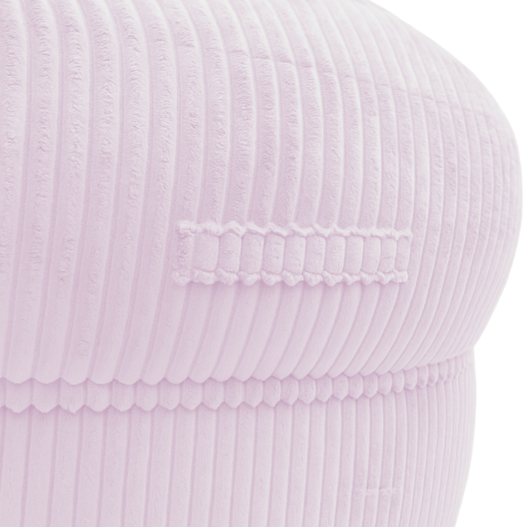 Gros plan sur la poignée du pouf XXL, tissu en velours côtelé.
