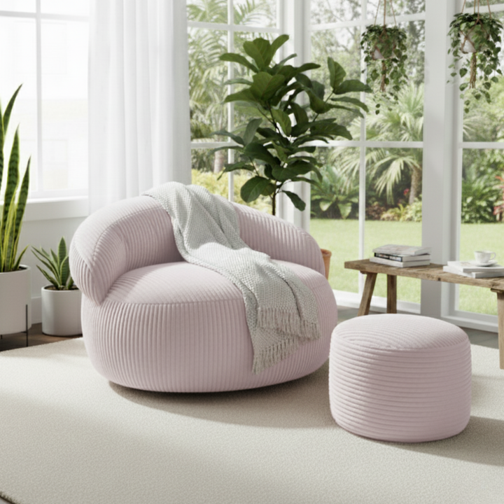 Pouf XXL velours côtelé rond avec repose-pieds assorti, dans un salon.
