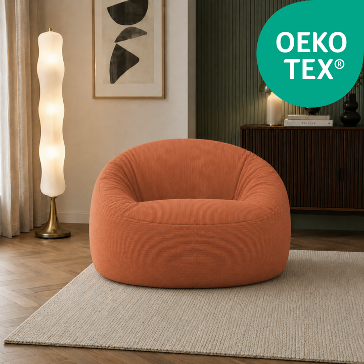 Pouf déhoussable rond en velours côtelé terracotta avec certification OEKO-TEX®.