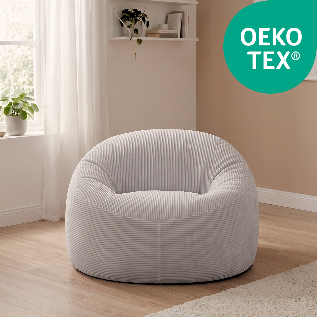 Pouf déhoussable en velours côtelé épais gris clair, forme ronde, assise rembourrée, tissu OEKO-TEX.