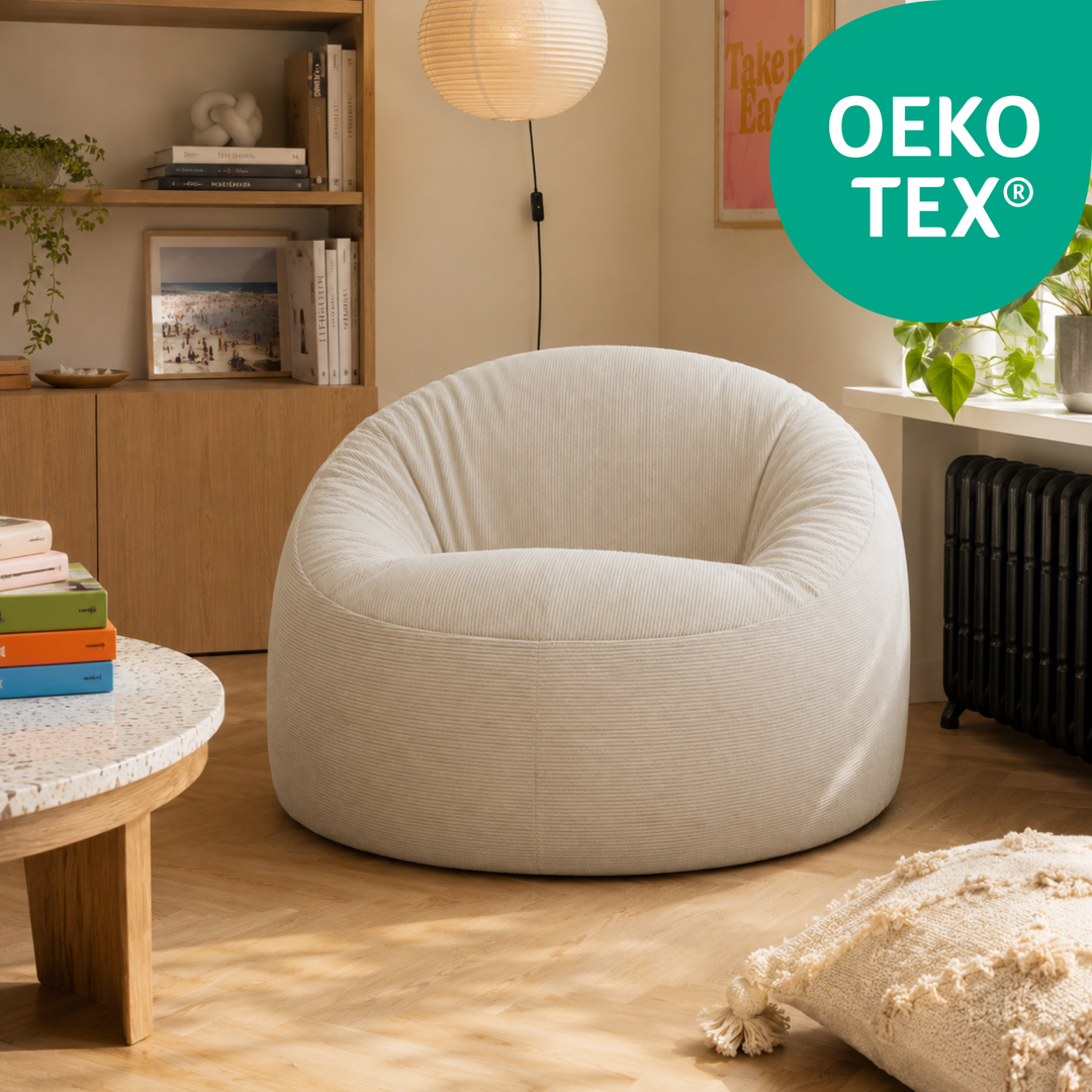 Pouf déhoussable en velours côtelé écru avec tissu OEKO-TEX.