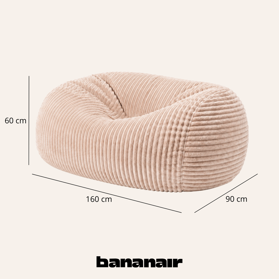 Pouf long géant déhoussable en fourrure côtelée beige, dimensions indiquées 160x90x60 cm