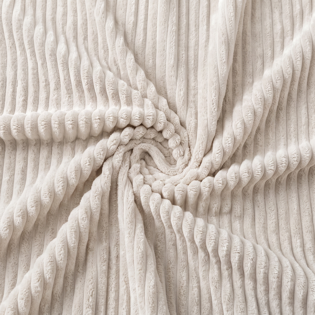 Tissu en velours côtelé blanc cassé, gros plan de la texture de la housse